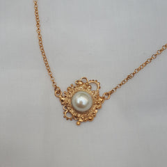 Coral cluster nestled pearl necklace