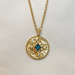 Centre of the cosmos coin pendant