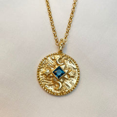 Centre of the cosmos coin pendant