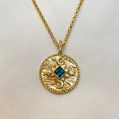 Centre of the cosmos coin pendant