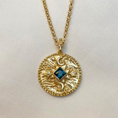 Centre of the cosmos coin pendant