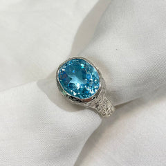 Etched Oval Sky Blue Topaz ring